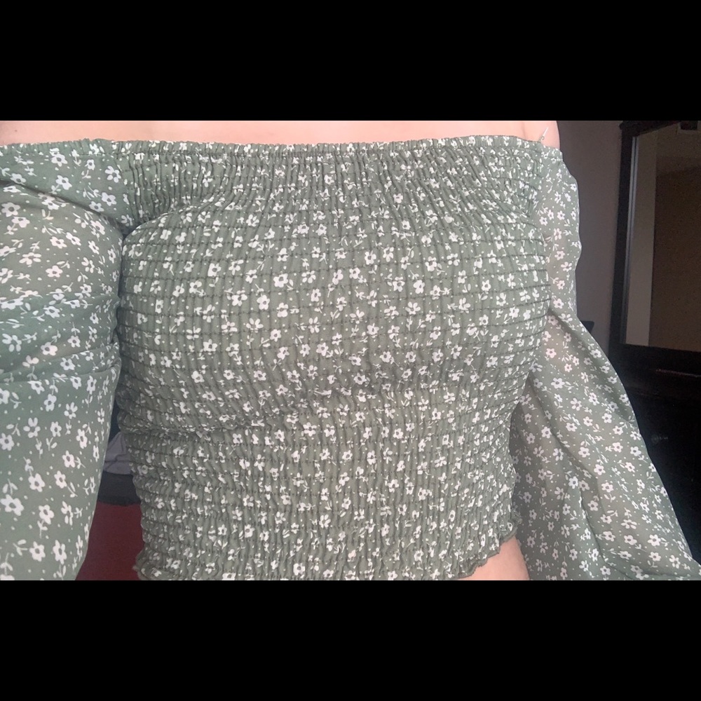 A sage off the shoulder crop top